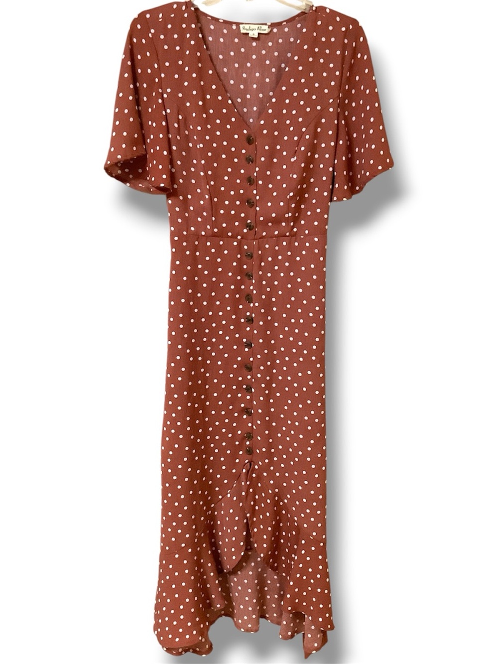 Indigo rose high low dusty rose, white polkadot dress wrapped around belt